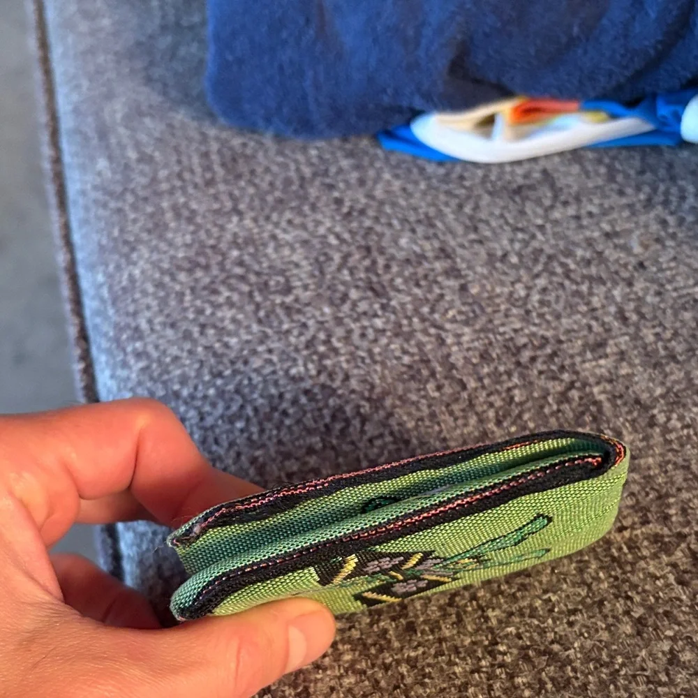 Green Embroidered Fabric Pouch for coins. Made in Japan. Recycled materials.
